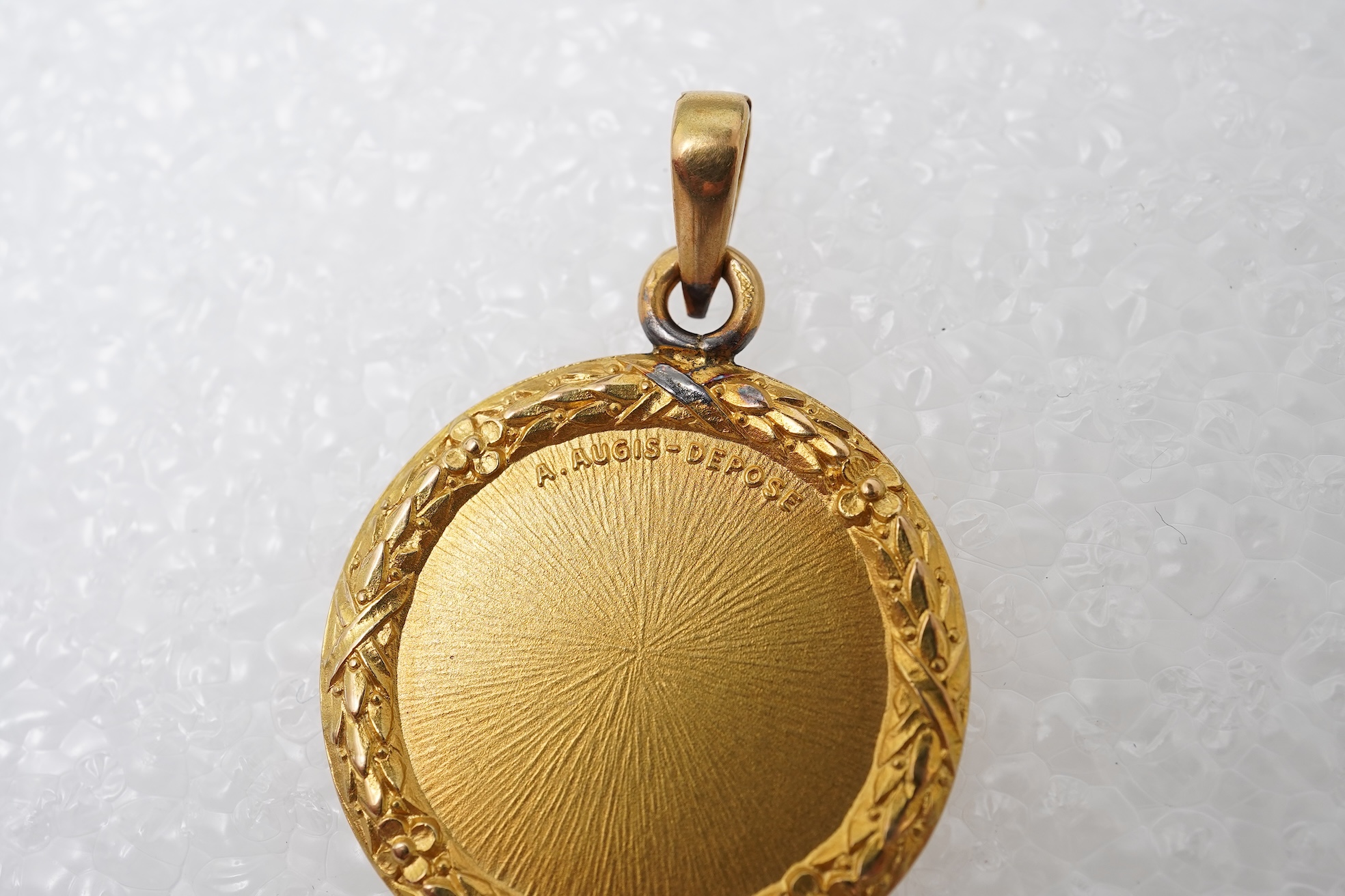 Alphonse Auguis, a medallion pendant, France, early 20th century